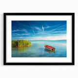 Extra large abstract art print of a colorful, textured European scenery on a black framed canvas.