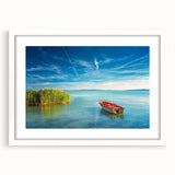 Textured abstract art print of a European scenery in muted earth tones, framed with a white mat, ideal for bedroom art.