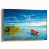 Framed canvas of a vintage poster depicting a black and gold European landscape, ideal for bedroom wall art.