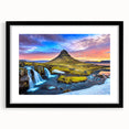 Abstract art print of a vibrant Icelandic landscape, featuring textured colors, in a large black frame with mat.