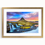 Abstract art print of an Icelandic landscape in muted gray and blue tones on a gold-framed canvas.