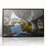 Large abstract wall art depicting a serene Irish landscape in muted green and blue tones, framed in black acrylic.