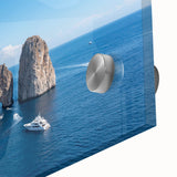 Large abstract wall art depicting the Capri coastline in muted blue and green tones on acrylic glass.