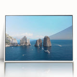 Mid-century modernist art depicting the Capri coastline in muted blue and green tones, acrylic print framed in white.