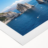 Art deco poster of Capri, Italy in muted blue and white tones on rolled canvas.