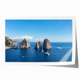 Rolled print of Capri scenery with lush greenery and vibrant blue ocean, ideal for art wall dining room.