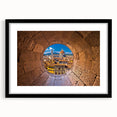 Colorful abstract art print of Florence scenery in vibrant hues on a large textured canvas, framed in black.
