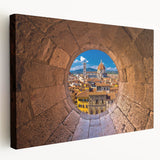 A stretched canvas print depicting the Florence skyline in muted earth tones, ideal for kitchen wall art.