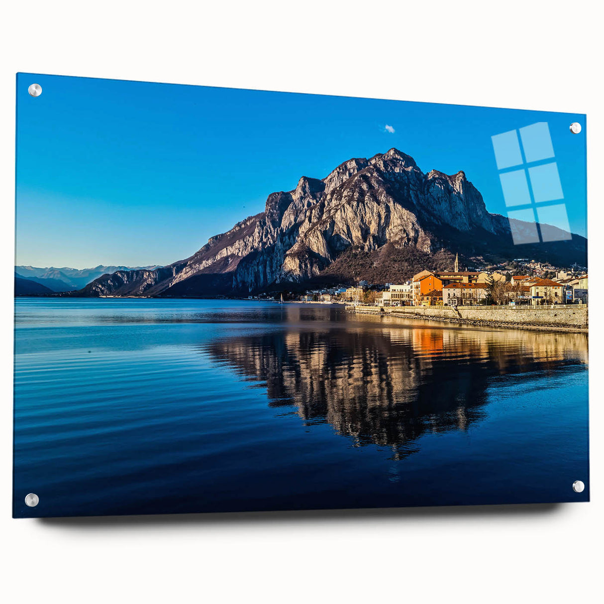 Acrylic print of Lake Como with vivid blue and green hues, ideal for dining room decor.