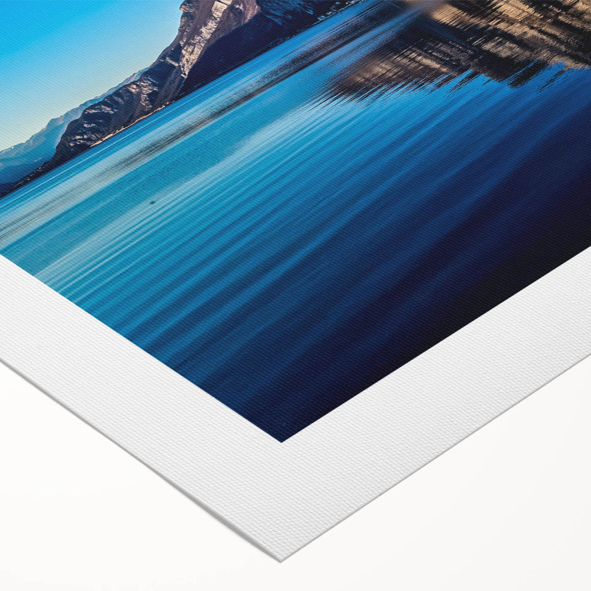 Art deco poster of Lake Como with soft blue and green hues on rolled canvas, suitable for dining room decor.