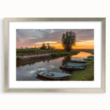 Extra large abstract art print featuring textured scenery of Latvia in muted earth tones, framed in silver.