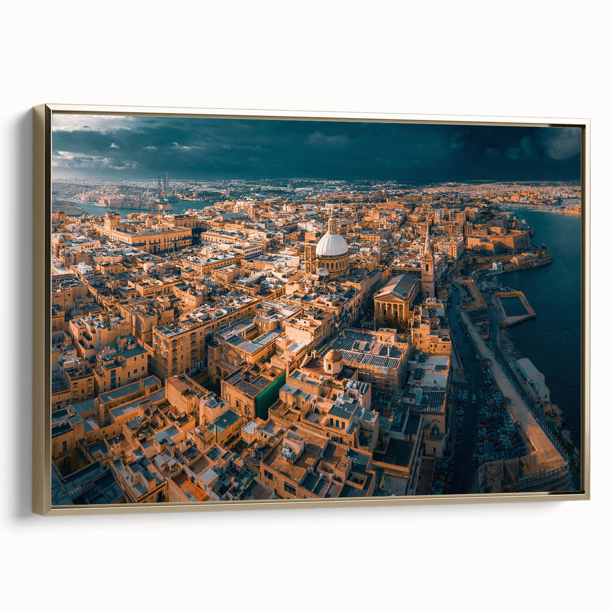 Framed canvas of a vintage Malta landscape in black and gold tones, ideal for bedroom wall art.