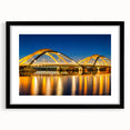 Extra large abstract art print of Amsterdam with vibrant colors and textures on a black framed canvas.