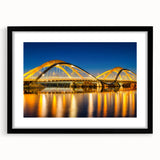 Extra large abstract art print of Amsterdam with vibrant colors and textures on a black framed canvas.