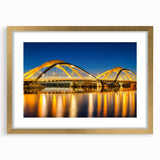 Abstract art print of Amsterdam scenery in muted earth tones on a framed canvas, suitable for bedroom or dining room decor.