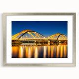 Extra large abstract art print depicting Amsterdam scenery in textured silver frame, ideal for living room decor.