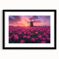 Colorful abstract art print of a European scenery in vibrant hues, framed in black with a mat, ideal for living room decor.