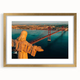 Abstract art print of Lisbon in muted gold and blue tones, framed with a gold mat, suitable for dining room decor.