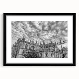 Colorful abstract art print of Andalusian scenery in vibrant hues on a large textured canvas, framed in black.