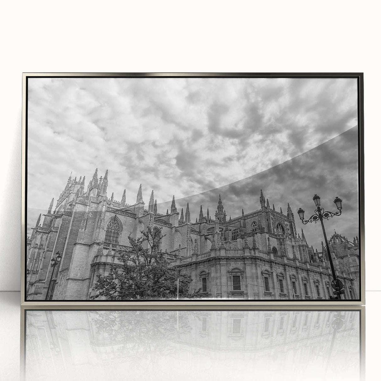 Mid-century modernist art depicting Andalucia landscape in muted earth tones on a silver-framed acrylic.