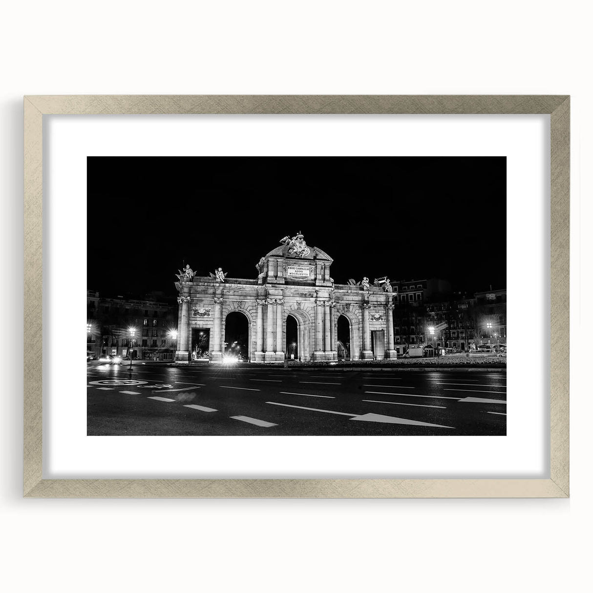 Textured abstract art print of Madrid scenery in muted earth tones, framed in silver, suitable for bedroom decor.