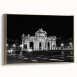 Framed canvas featuring a vintage poster art of Madrid landscape in muted gold and black, ideal for bedroom wall decor.