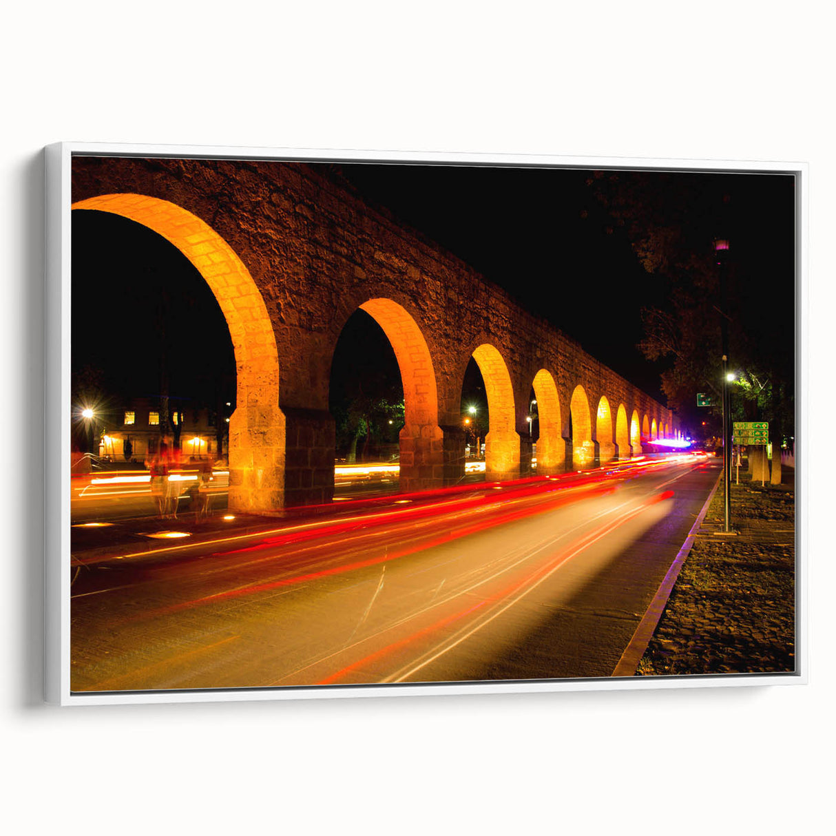 Vintage poster art of Mexico City in vibrant colors on a large framed canvas, ideal for living room decor.