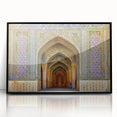 Large abstract wall art depicting a Middle Eastern scenery in muted earth tones on a black framed acrylic.
