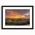 Extra large abstract art print of a Middle Eastern scenery in vibrant colors on a textured canvas, framed in black.