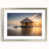 Textured art print of an abstract ocean scene in shades of blue and aqua on a silver-framed canvas, suitable for bedroom art.