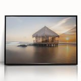 Large abstract wall art depicting the serene Bora Bora scenery in muted blue and green tones, framed in black acrylic.