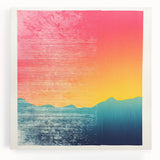 Black and white photograph of Tahitian shoreline on stretched canvas, featuring palm trees and calm waters.