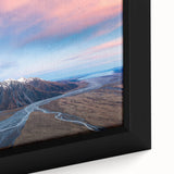 Black wall art featuring a textured depiction of New Zealand's Canterbury scenery in vibrant colors, framed canvas.