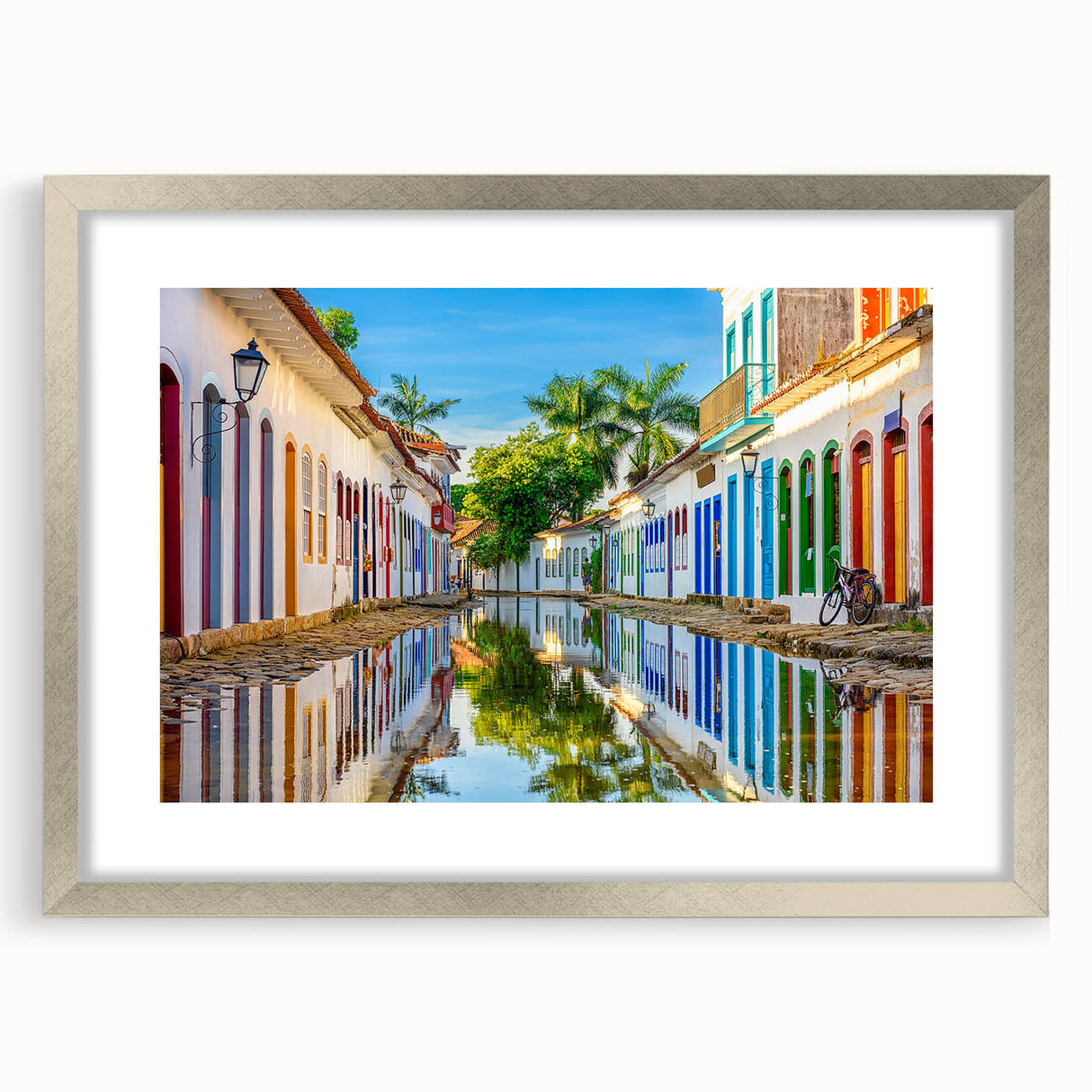 Textured abstract art print of a Brazilian landscape in muted earth tones, framed with a silver mat, ideal for bedroom art.