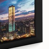 Extra large framed canvas showcasing a textured depiction of a Colombian landscape in black with vibrant, colorful accents.