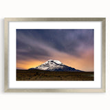 Textured abstract art print depicting a South American landscape in earthy tones, framed in silver.