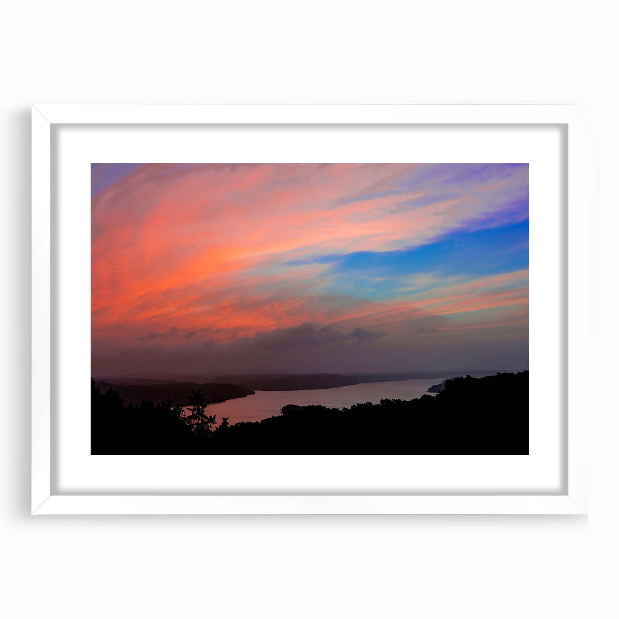 Abstract art print depicting a serene Arkansas landscape in soft blue and green tones, framed with a white mat.