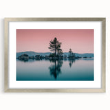 Textured abstract art print of Lake Tahoe in muted blue and green tones on a framed silver mat, ideal for bedroom art.