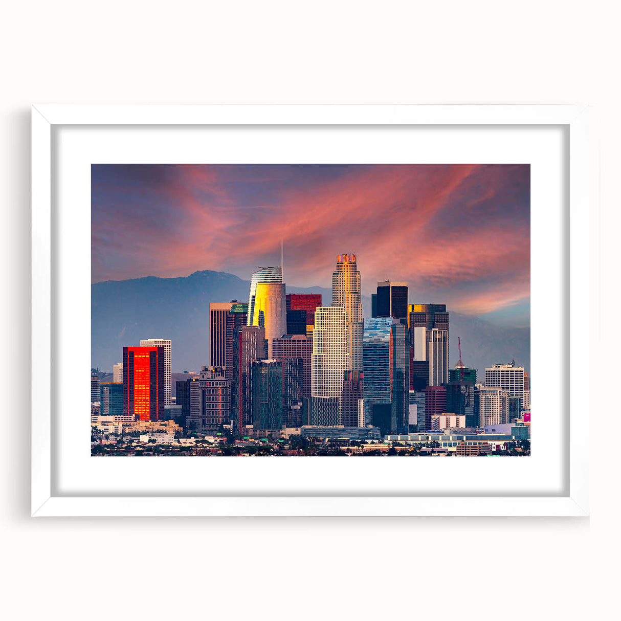 Abstract art print of Los Angeles skyline in muted gray and blue tones on a framed white mat, ideal for dining room decor.