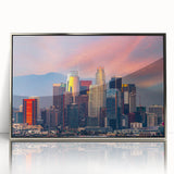 Mid-century modernist art depicting Los Angeles skyline in muted gray tones on a silver-framed acrylic print.