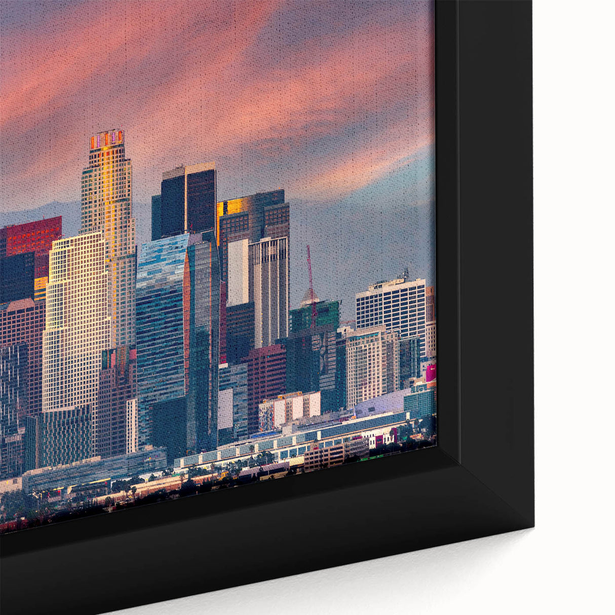 Extra large framed canvas featuring a textured depiction of the Los Angeles skyline in black with colorful art accents.