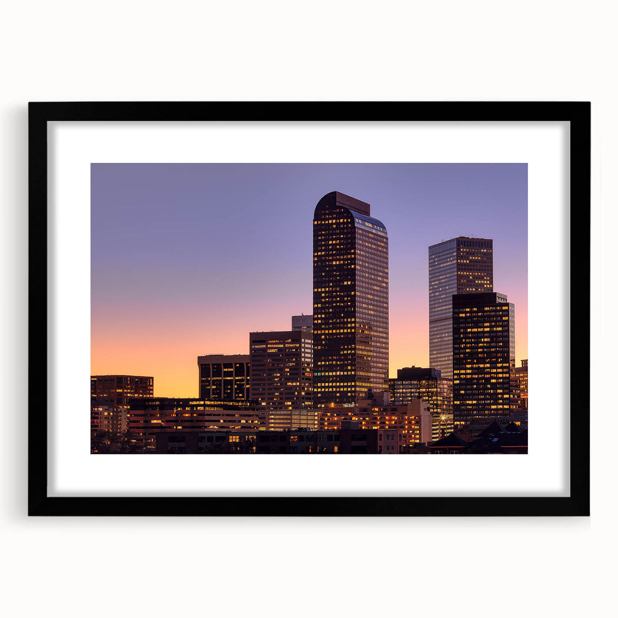 Abstract art print of Denver scenery in vibrant colors on a large canvas, ideal for living room decor.