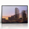 Large abstract wall art depicting Denver skyline in muted gray and blue tones, framed in black acrylic.