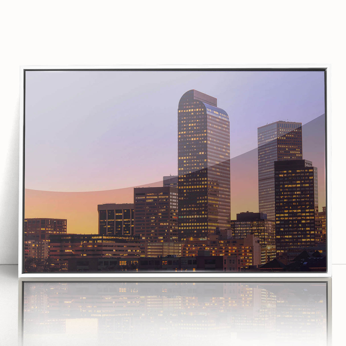 Acrylic print of Denver skyline with muted blue and gray tones, framed in white, ideal for modern art wall decor.