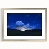 Textured abstract art print of Colorado Springs in muted earth tones on a framed canvas, suitable for bedroom decor.