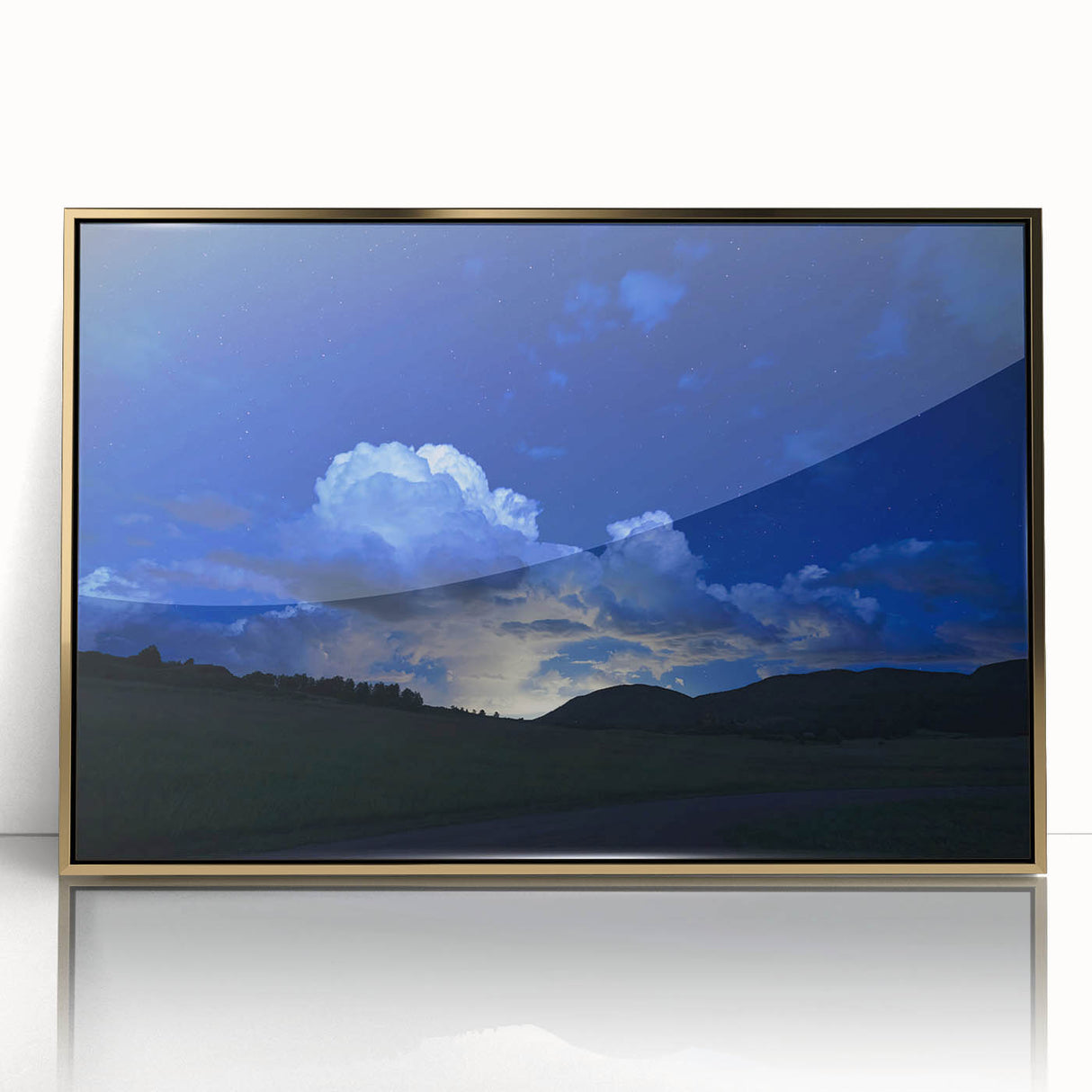 Large art print depicting the Colorado Springs landscape in soft pastel shades, framed in gold acrylic.