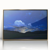 Large art print depicting the Colorado Springs landscape in soft pastel shades, framed in gold acrylic.