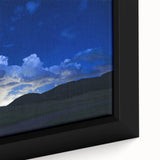 Textured black wall art depicting Colorado Springs in vibrant colors on a framed canvas, suitable for a large living room.