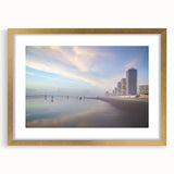 Extra large abstract art print featuring textured waves in muted blues and grays, framed in gold.