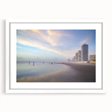Abstract art print of Daytona scenery in muted blue and white tones on a framed white mat.